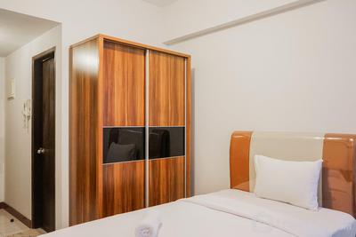 Comfy and Minimalist Studio Apartment Scientia Residence Tower B By Travelio