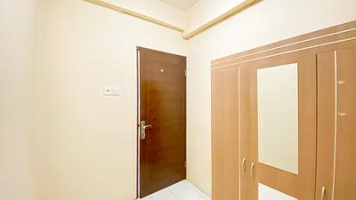 Apartemen City Park - Unfurnished 2BR with One AC in Living Room at City Park Apartment By Travelio