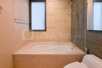 Apartemen Marigold Nava Park - Modern Wood Accent 2BR at Marigold Nava Park Apartment By Travelio