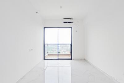 Nice 2BR Unfurnished with AC at Sky House BSD Apartment By Travelio