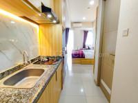 Apartemen Grand Dharmahusada Lagoon - Wood Accents Studio at Grand Dharmahusada Lagoon Apartment by Travelio