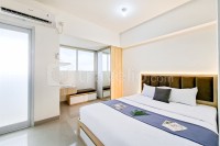 Comfy Studio with City View at Cisauk Point Apartment By Travelio