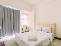 Simply Homey Studio at Vida View Apartment By Travelio