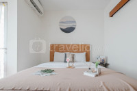 Simple Studio with Direct Access Mall at Grand Kamala Lagoon Apartment By Travelio