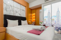 Comfy Minimalist Studio Room at Suncity Residence Apartment By Travelio