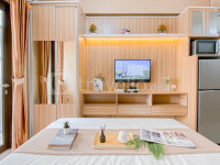 Warm Contemporary Studio Apartment at Transpark Cibubur By Travelio