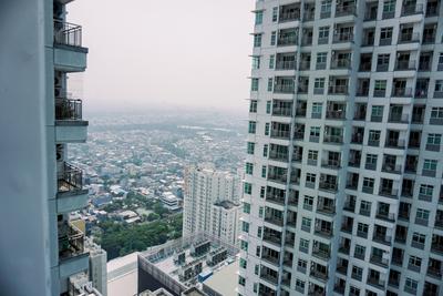 Apartemen Green Bay Condominium - 2BR Unfurnished with AC at Green Bay Condominium Apartment By Travelio