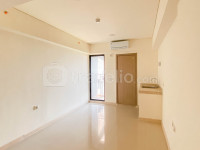 Apartemen Meikarta - Functional Unfurnished Studio at Apartment Meikarta with AC By Travelio