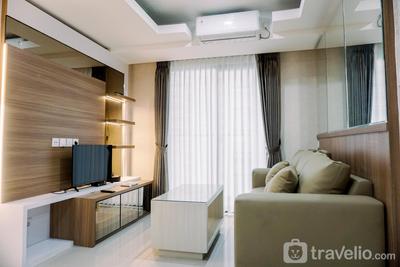 Spacious and Homey 2BR at Daan Mogot City Apartment By Travelio