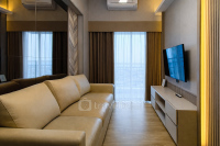 Restful 2BR with City View at Apartment Orchard Supermall Mansion By Travelio