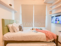 Modern and Spacious 2BR Apartment Green Bay Condominium By Travelio