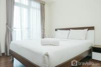 Cozy and Furnished 1BR Puri Orchard Apartment By Travelio