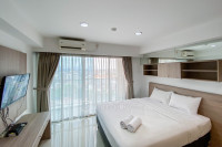 Homey and Nice Studio Tamansari The Hive Apartment By Travelio