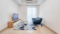 Best Deal 1BR and Modern Look at Grand Sungkono Lagoon Apartment By Travelio