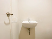 Apartemen Meikarta - New Unfurnished Studio with AC at 2nd Floor Meikarta Apartment By Travelio