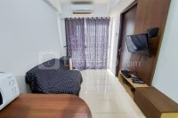 Cozy Living and Tidy 2BR Serpong Greenview Apartment By Travelio