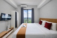 Classic and Homey Gray Studio at Apartment The Ayoma By Travelio