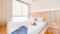 Comfy and Minimalist 2BR Tokyo Riverside PIK 2 Apartment By Travelio