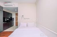 Fancy and Nice Studio Room at Puri Orchard Apartment By Travelio