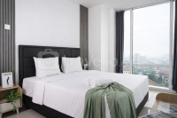 2BR Apartment with Service Room and Sofa Bed at Woodland Park Residence By Travelio