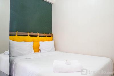 Apartemen Puncak Dharmahusada - Relaxing and Serene 2BR Apartment at Puncak Dharmahusada By Travelio