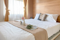 Minimalist 2BR Apartment at Green Pramuka City By Travelio