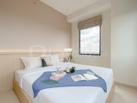 Modern Look and Cozy 2BR Apartment Transpark Cibubur By Travelio