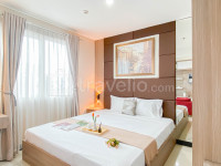 Studio Suite with Poolside View at Sky Terrace Apartment By Travelio