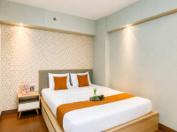 Warm Living in 2BR at Apartment Pluit Sea View By Travelio