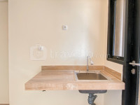 Apartemen Meikarta - Unfurnished 2BR with AC at Living Room Meikarta Apartment By Travelio