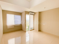 Apartemen LRT City Sentul - Royal Sentul Park - Unfurnished Studio Room with AC at Royal Sentul Park Apartment By Travelio