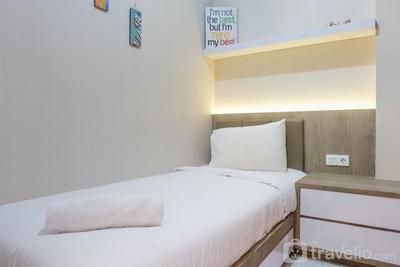 Apartemen Puncak Dharmahusada - Relaxing and Serene 2BR Apartment at Puncak Dharmahusada By Travelio