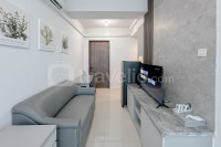 Combined Grey Toned 2BR Apartment at The City Square Surabaya By Travelio