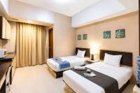 Cozy Studio Room (No Kitchen) at Skyland City Jatinangor Apartment By Travelio