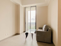 Apartemen Menara Jakarta Kemayoran - Unfurnished 2BR with AC and Maid Room Menara Jakarta Kemayoran Apartment By Travelio