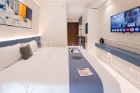 Minimalist Functional Studio at Transpark Bintaro Apartment By Travelio