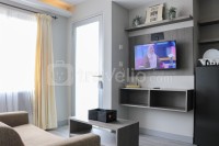 Grey Toned 2BR Apartment at Grand Asia Afrika By Travelio