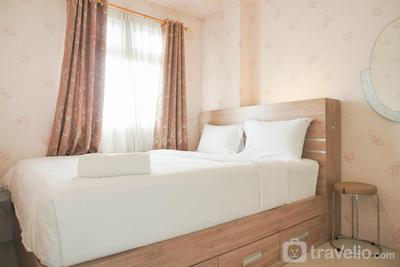 Comfort 2BR Green Pramuka City Apartment near Shopping Center By Travelio