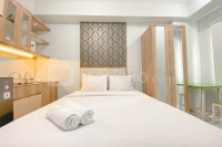 Basic Studio at Candiland Apartment By Travelio