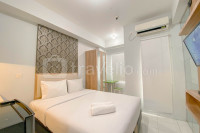 Basic Studio at Candiland Apartment By Travelio