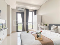 Apartemen Monroe Tower - Cozy Warm Tone Studio at Monroe Tower Apartment By Travelio