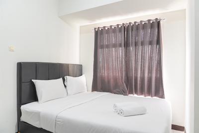 Comfort and Homey 2BR at Pluit Sea View Apartment By Travelio