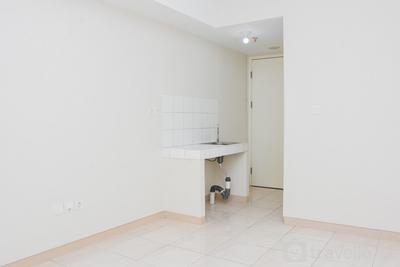 Unfurnished Studio with AC at 15th Floor Springlake Summarecon Apartment By Travelio