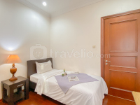 Spacious 2BR with Mall Access at Bellezza Apartment By Travelio