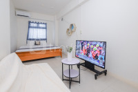 Cozy and Simply 1BR Green Pramuka City Apartment By Travelio