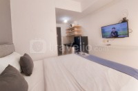 Fully Furnished and Homey Studio Serpong Garden Apartment By Travelio