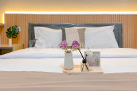 Restful and Homey Studio at LRT City Jatibening Apartment By Travelio