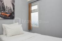 Nice and Cozy Living 2BR at Green Pramuka City Apartment By Travelio