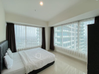 Apartemen Grand Kamala Lagoon - Practical Semi Furnished 2BR at Grand Kamala Lagoon Apartment By Travelio