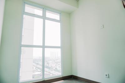 Apartemen Puri Orchard - Comfy 2BR Unfurnished at 25th Floor Puri Orchard Apartment By Travelio